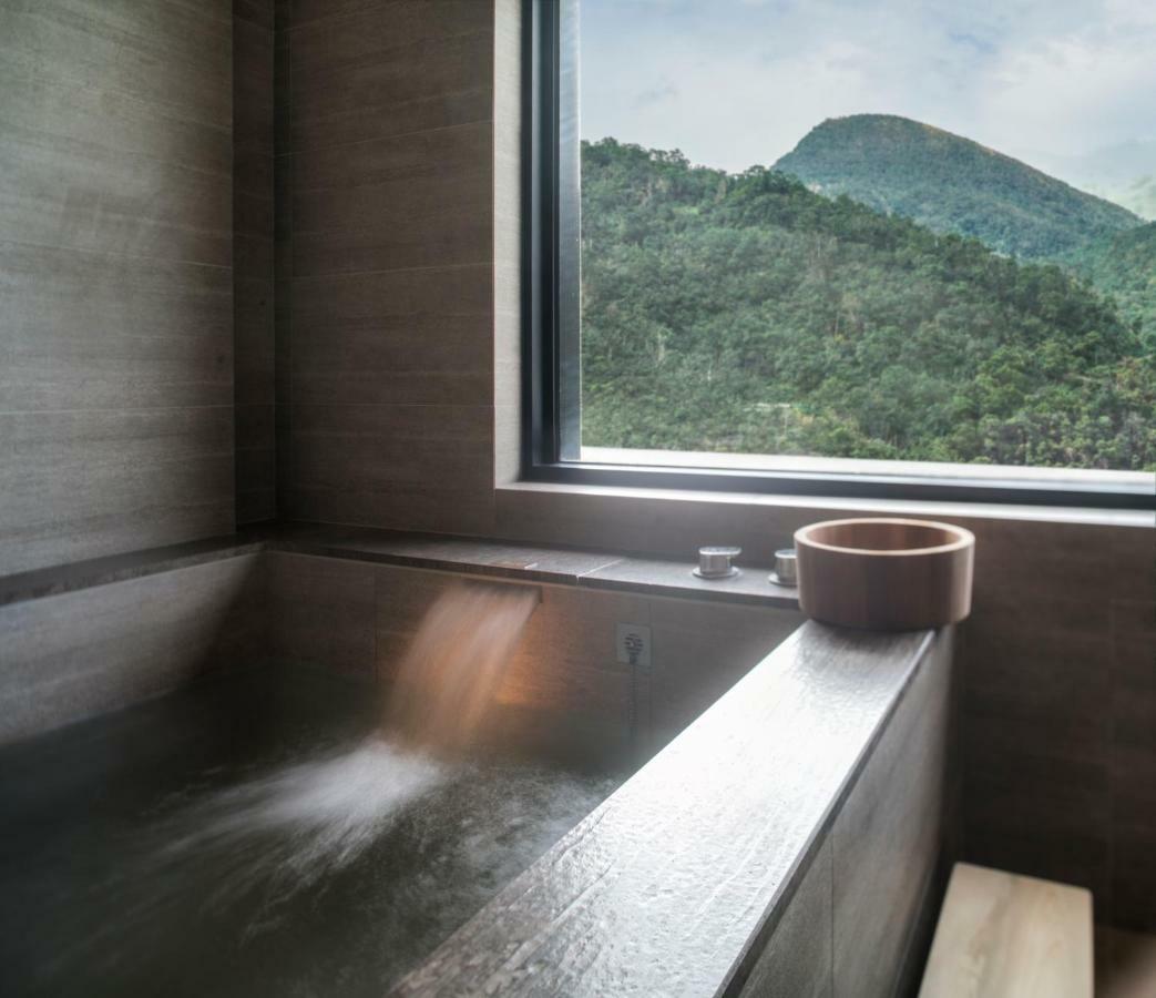 Mu Jiaoxi Hotel Екстер'єр фото A modern onsen bath