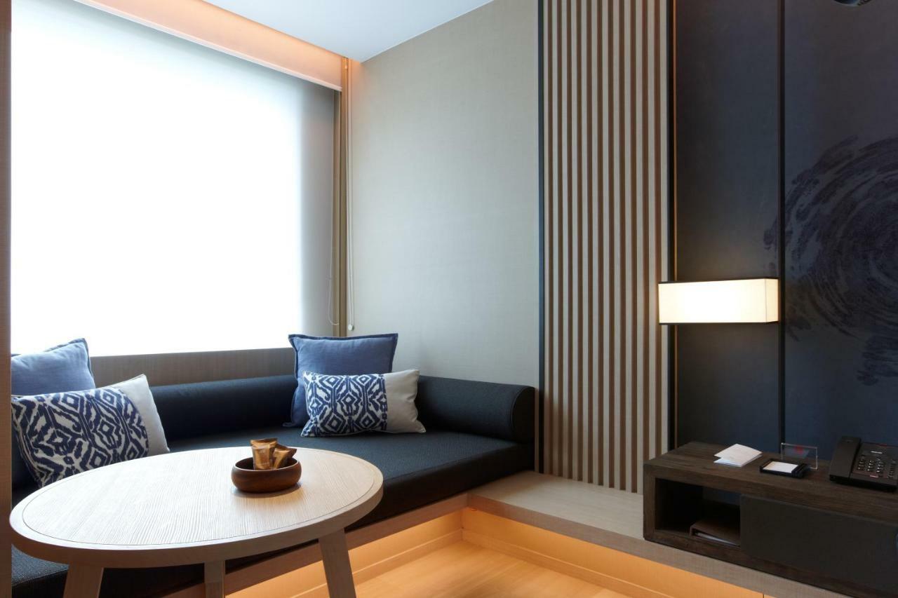 Mu Jiaoxi Hotel Екстер'єр фото A room at the hotel